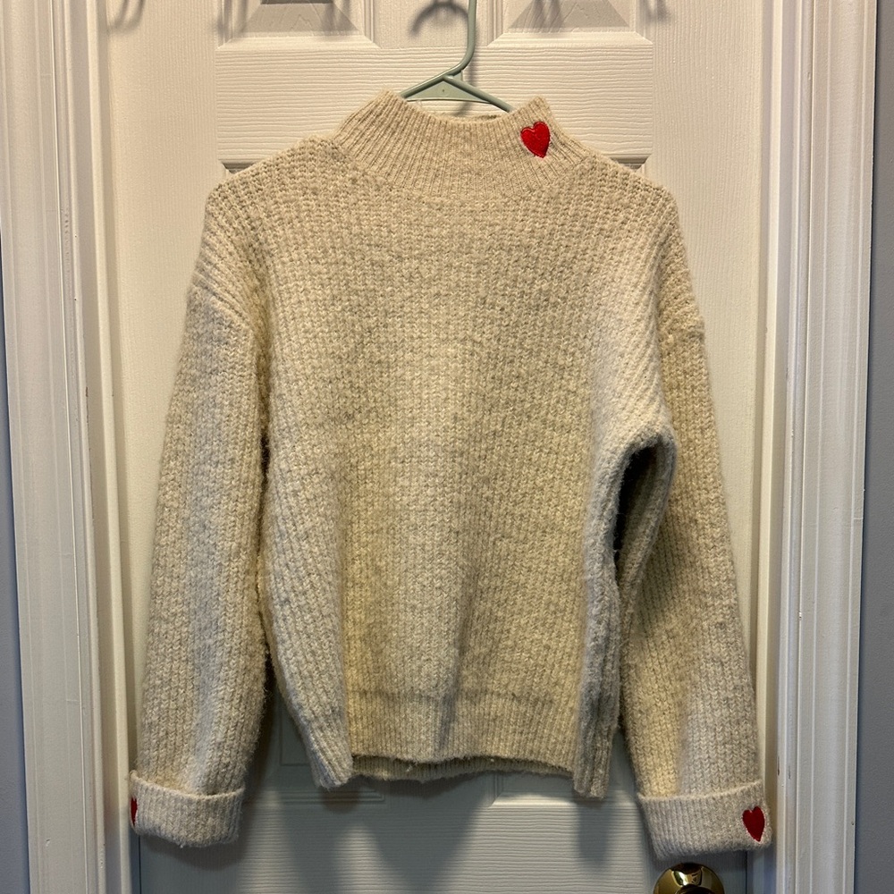 Cozy Cream Sweater with Red Heart Accents